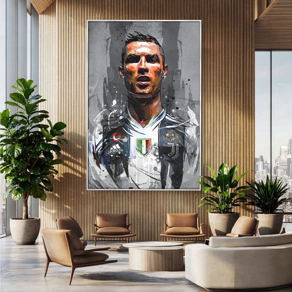 Tablou canvas cu tablou portret cristiano ronaldo juventus, in rama de aluminiu argintiu, pe perete intr-un birou